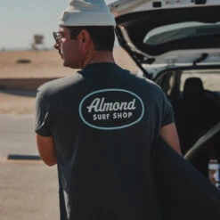 Surf Shop Tee | Faded Black -Almond Surfboards Shop surf shop blk back